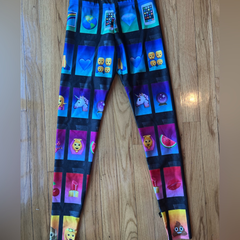 Girl terez leggings! Great quality size large! Emoji cell phone design.